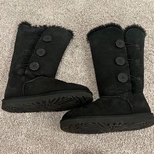 Black Ugg size 7 with buttons.